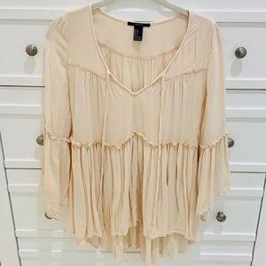 Blush hi-lo peasant top